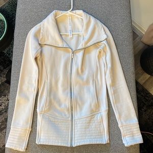 Cream colored in good condition Lululemon jacket.